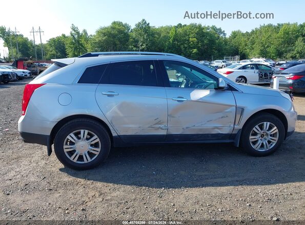 3GYFNBE36GS506939 2016 CADILLAC SRX Silver Widok wnętrza z tyłu