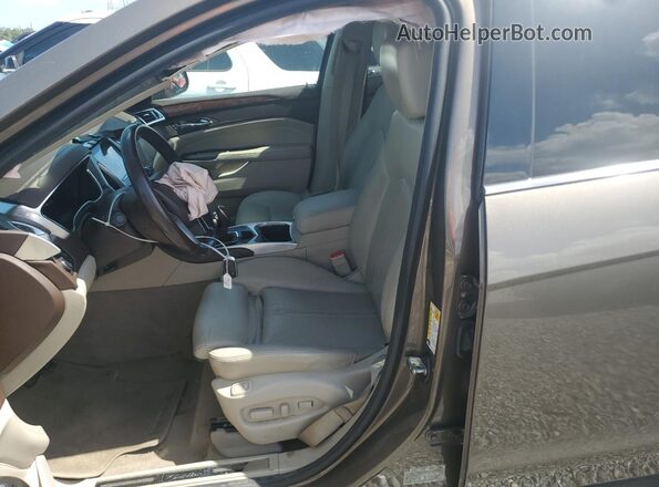 3GYFNBE36GS555512 2016 CADILLAC SRX Gold Widok wnętrza z przodu