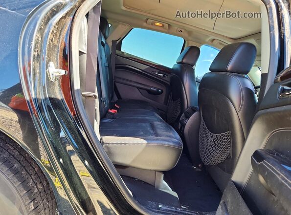 3GYFNBE38GS500821 2016 CADILLAC SRX Черный Вид задней части салона