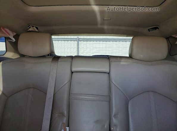 3GYFNBE39GS547386 2016 CADILLAC SRX Gold Widok tylnych siedzeń