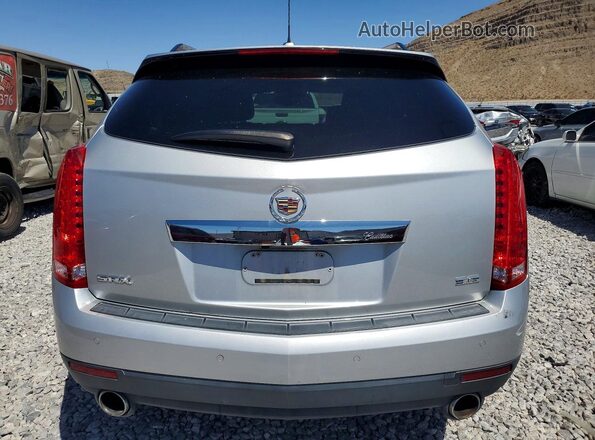3GYFNBE3XGS567517 2016 CADILLAC SRX Серебряный Вид сзади