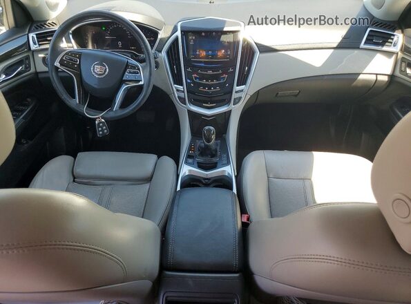 3GYFNBE3XGS567517 2016 CADILLAC SRX Серебряный Вид панели приборов