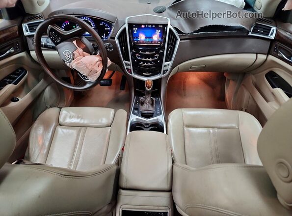 3GYFNCE30GS584526 2016 CADILLAC SRX Красный Вид панели приборов