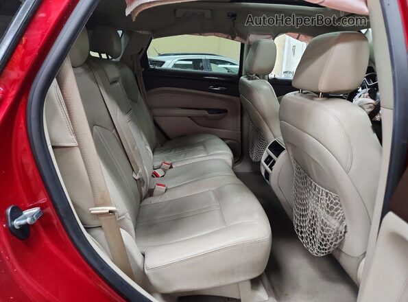 3GYFNCE30GS584526 2016 CADILLAC SRX Красный Вид задней части салона