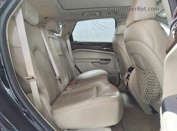 3GYFNCE32GS577724 2016 CADILLAC SRX Черный Вид задней части салона
