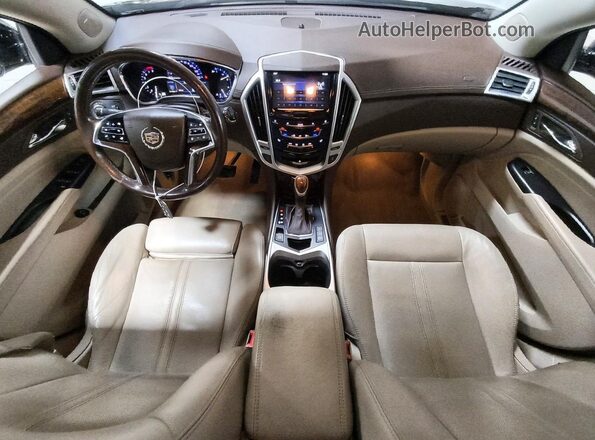 3GYFNCE32GS577724 2016 CADILLAC SRX Черный Вид панели приборов