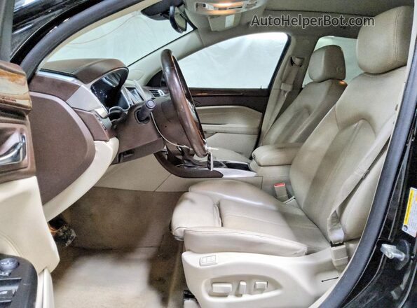 3GYFNCE32GS577724 2016 CADILLAC SRX Черный Вид салона спереди