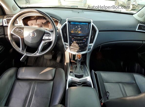 3GYFNCE37GS562183 2016 CADILLAC SRX Черный Вид панели приборов