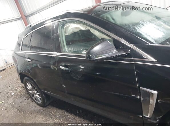 3GYFNCE39GS559589 2016 CADILLAC SRX Black Widok wnętrza z tyłu