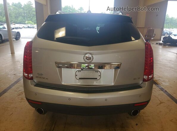 3GYFNDE35GS575505 2016 CADILLAC SRX Silver Vista trasera