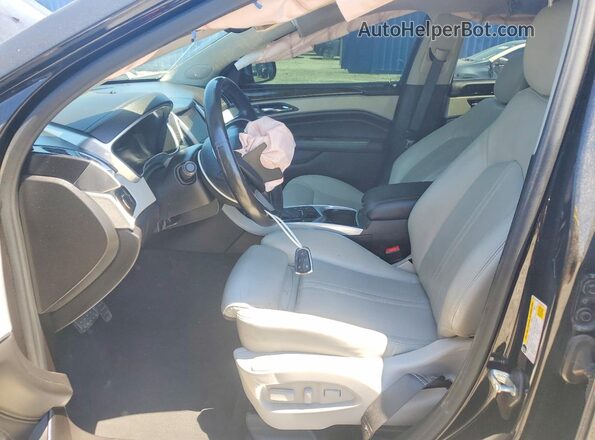 3GYFNEE31GS572672 2016 CADILLAC SRX Черный Вид салона спереди