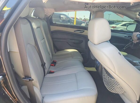 3GYFNEE31GS572672 2016 CADILLAC SRX Черный Вид задней части салона
