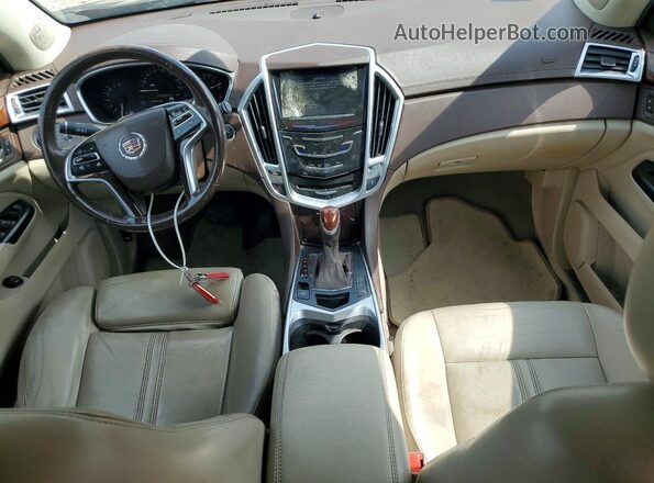 3GYFNEE33GS507984 2016 CADILLAC SRX Коричневый Вид панели приборов