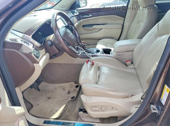 3GYFNEE33GS507984 2016 CADILLAC SRX Коричневый Вид салона спереди