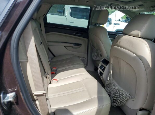 3GYFNEE33GS507984 2016 CADILLAC SRX Коричневый Вид задней части салона