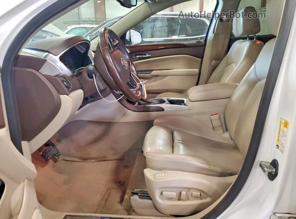 3GYFNEE37GS535724 2016 CADILLAC SRX Cream Front interior view