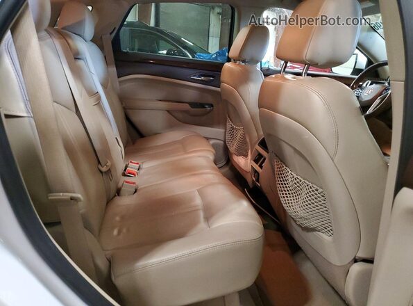 3GYFNEE37GS535724 2016 CADILLAC SRX Cream Rear interior view