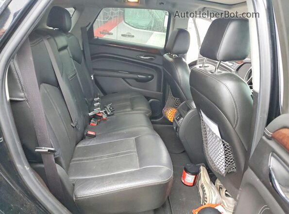 3GYFNEE37GS574491 2016 CADILLAC SRX Black Սալոնի հետևի տեսք
