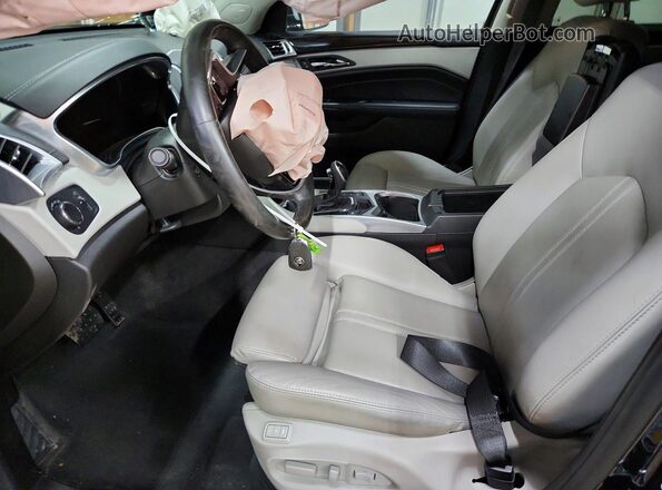 3GYFNEE3XGS526600 2016 CADILLAC SRX Charcoal Vista interior delantera