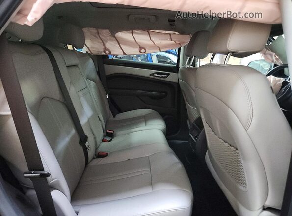 3GYFNEE3XGS526600 2016 CADILLAC SRX Charcoal Vista interior trasera