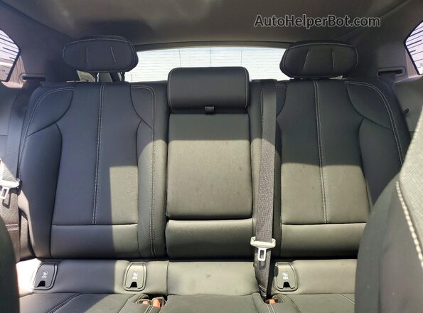 3GYK3BMRXSS267902 2025 CADILLAC OPTIQ Red Вид задніх сидінь