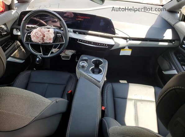 3GYK3EM45TS134794 2026 CADILLAC OPTIQ Черный Вид панели приборов