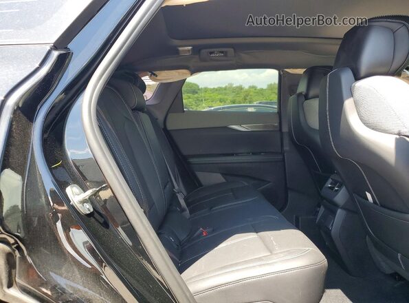 3GYK3EM45TS134794 2026 CADILLAC OPTIQ Черный Вид задней части салона