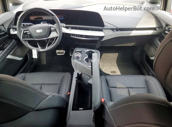 3GYK3GM49TS118853 2026 CADILLAC OPTIQ Red Առջևի վահանակի տեսք