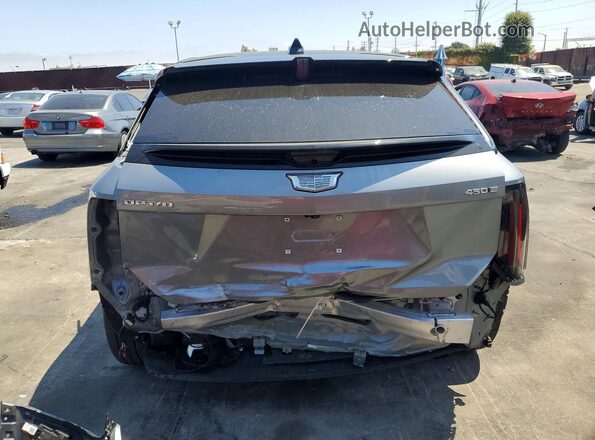 3GYK3GM50TS116899 2026 CADILLAC OPTIQ Серебряный Вид сзади