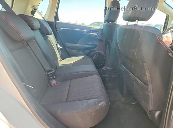 3HGGK5H75JM729215 2018 HONDA FIT White Vista de los asientos traseros