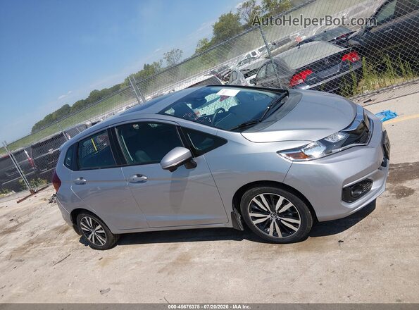 3HGGK5H84KM731306 2019 HONDA FIT Silver Widok wnętrza z tyłu