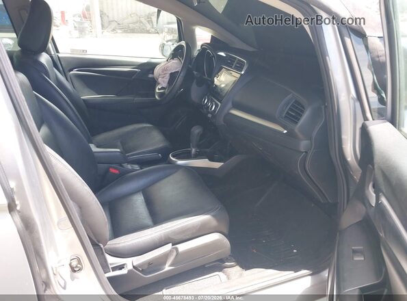 3HGGK5H95KM734417 2019 HONDA FIT Серебряный Вид салона спереди