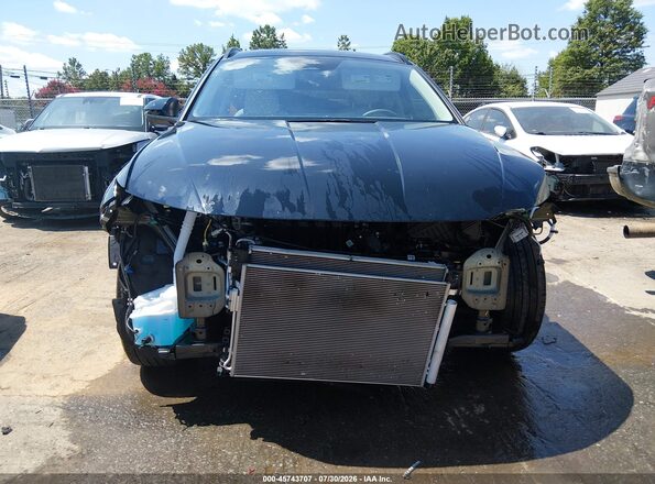 3KMJB3DEXSE002674 2025 HYUNDAI TUCSON Черный Вид задней части салона