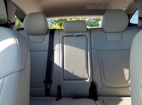 3KMJC3DEXSE009704 2025 HYUNDAI TUCSON Black Rear seats view