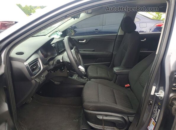 3KPA24AB8KE158604 2019 KIA RIO Gray Front interior view