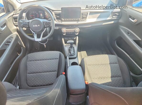 3KPA24AD0PE612580 2023 KIA RIO Blue Вид панелі приладів