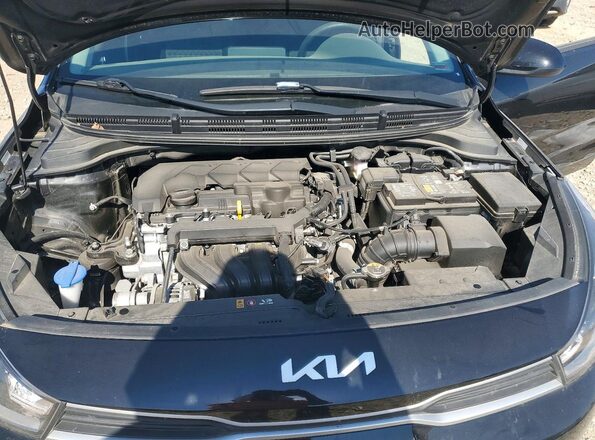 3KPA24AD1PE559470 2023 KIA RIO Черный Вид задней части салона