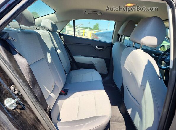 3KPA24AD2ME423912 2021 KIA RIO Black Rear seats view