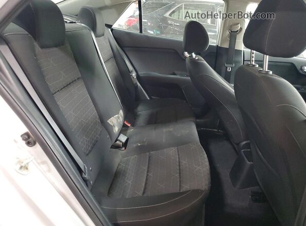 3KPA24AD4LE330047 2020 KIA RIO Silver Rear seats view
