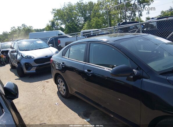 3KPA24AD5PE628709 2023 KIA RIO Black Vista interior trasera