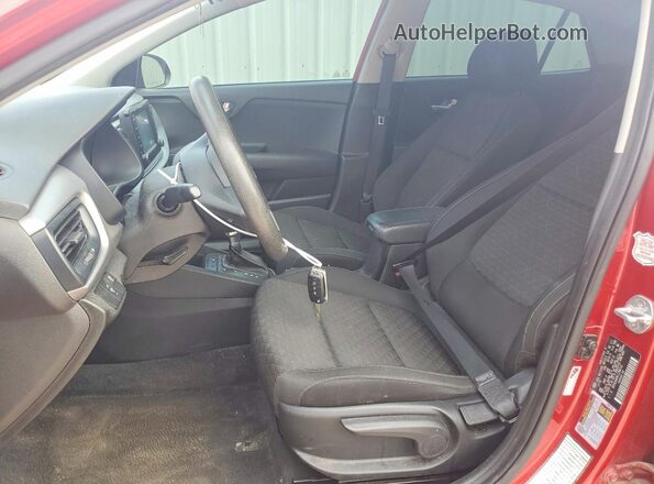 3KPA24AD6LE288142 2020 KIA RIO Red Front interior view