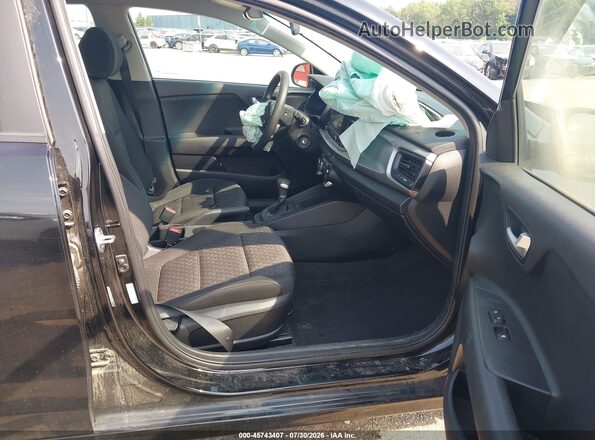 3KPA24AD7PE551129 2023 KIA RIO Black Vista interior delantera