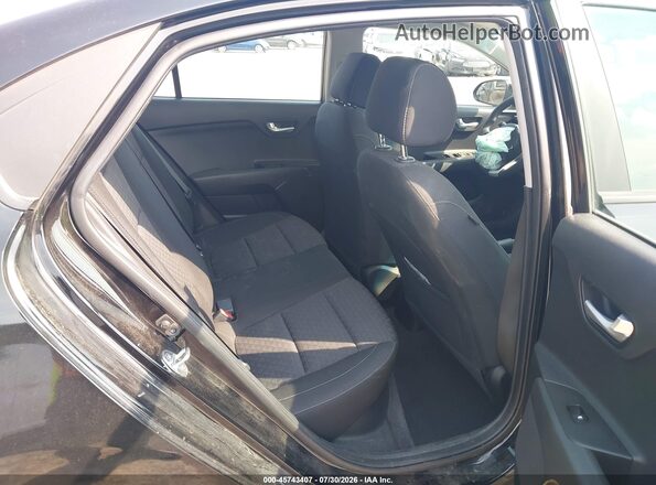 3KPA24AD7PE551129 2023 KIA RIO Black Vista de la etiqueta del VIN