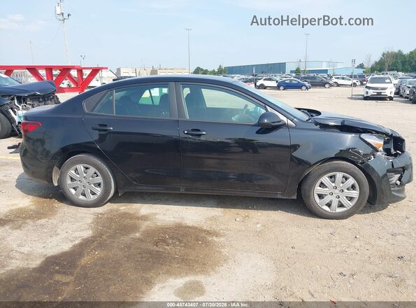 3KPA24AD7PE551129 2023 KIA RIO Black Vista interior trasera
