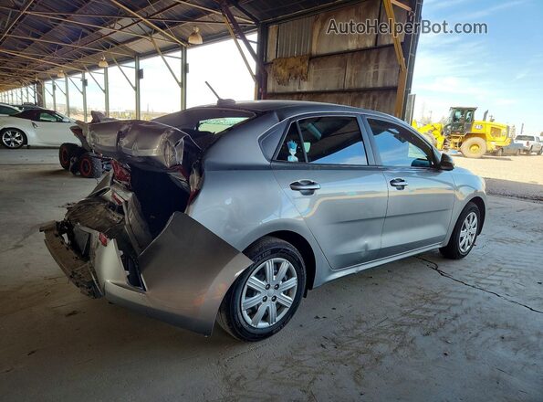 3KPA24AD7PE567721 2023 KIA RIO Gray Trasero derecho