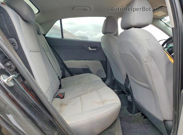 3KPA24AD8PE526398 2023 KIA RIO Black Հետևի նստատեղերի տեսք