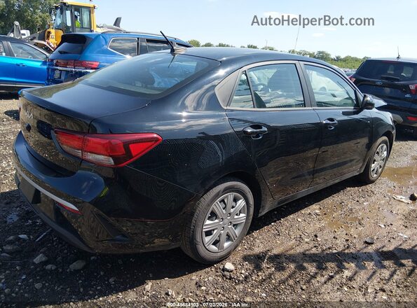 3KPA24AD8PE546540 2023 KIA RIO Черный Вид задней части салона