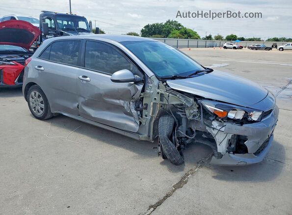 3KPA25AD3PE628438 2023 KIA RIO Gray Delantero derecho