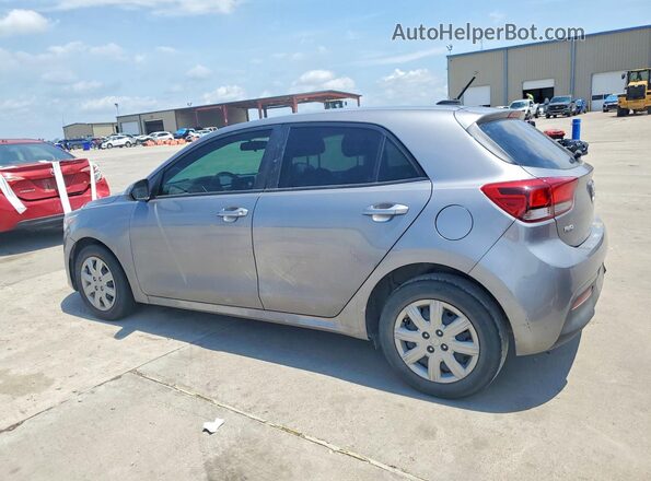 3KPA25AD3PE628438 2023 KIA RIO Gray Trasero izquierdo