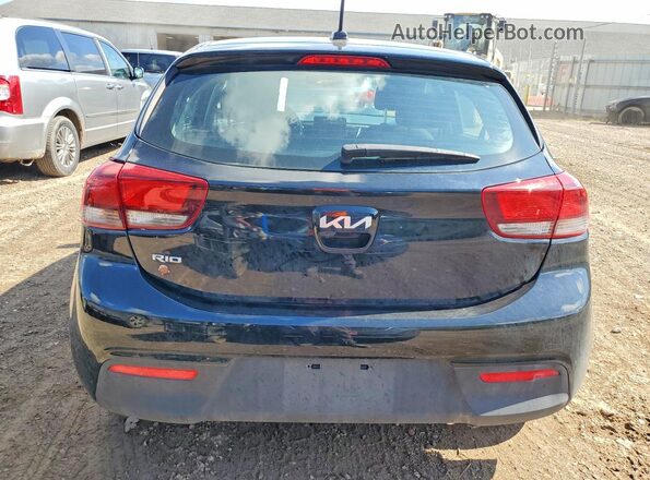 3KPA25AD9PE622627 2023 KIA RIO Black Вид ззаду
